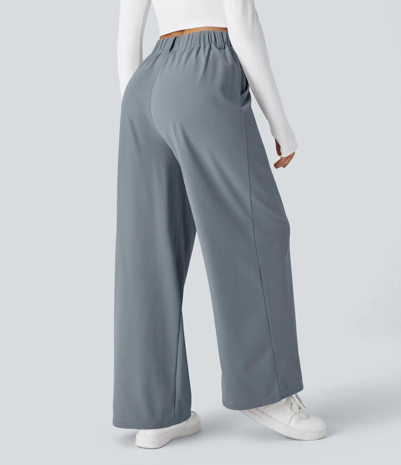 Hose aus Stretchmaterial mit hohem Bund, Waffelmuster, Seitentaschen und weitem Bein