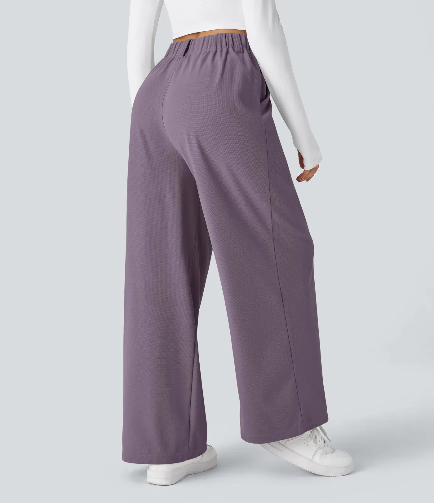 Hose aus Stretchmaterial mit hohem Bund, Waffelmuster, Seitentaschen und weitem Bein