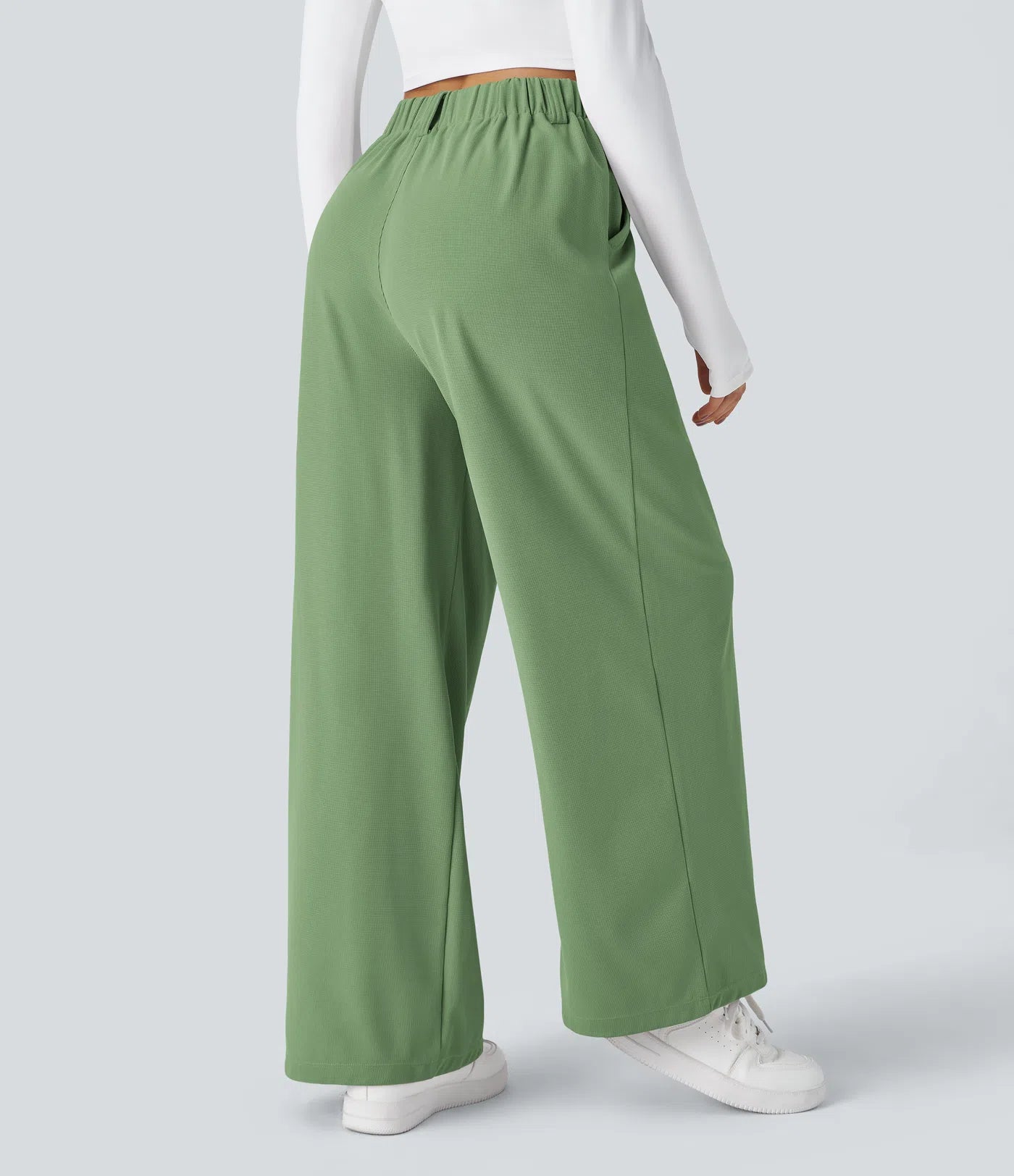 Hose aus Stretchmaterial mit hohem Bund, Waffelmuster, Seitentaschen und weitem Bein
