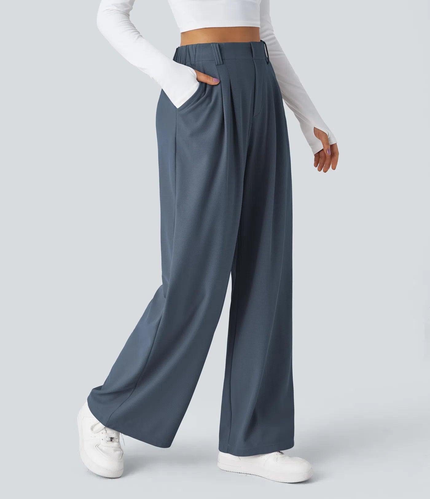 Hose aus Stretchmaterial mit hohem Bund, Waffelmuster, Seitentaschen und weitem Bein