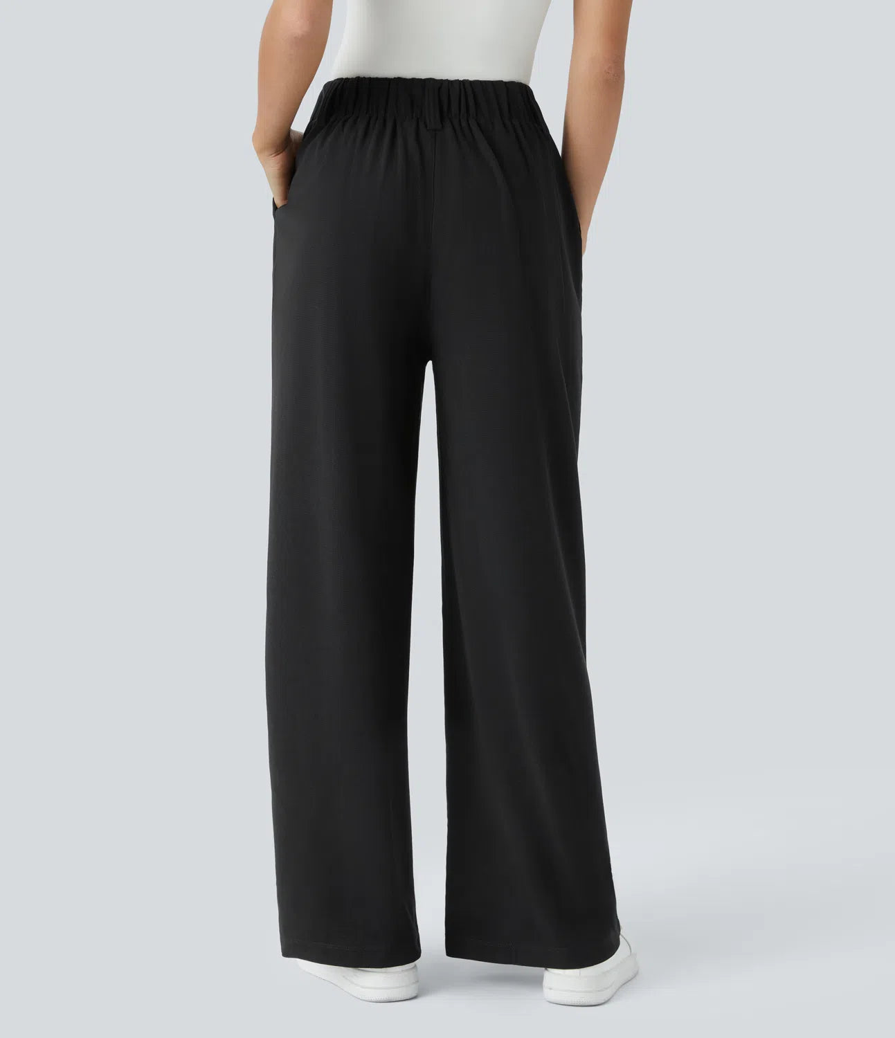 Hose aus Stretchmaterial mit hohem Bund, Waffelmuster, Seitentaschen und weitem Bein