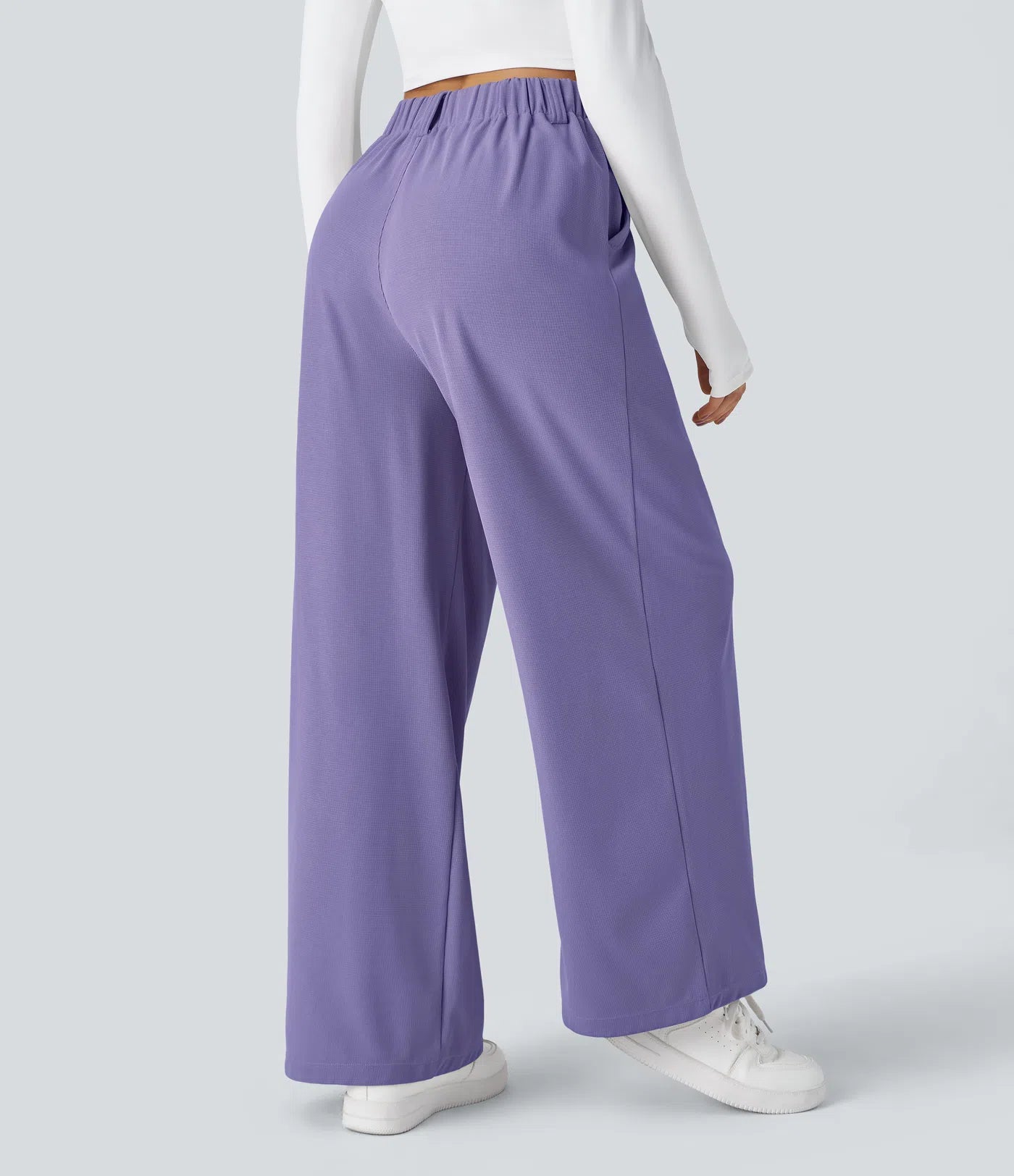 Hose aus Stretchmaterial mit hohem Bund, Waffelmuster, Seitentaschen und weitem Bein